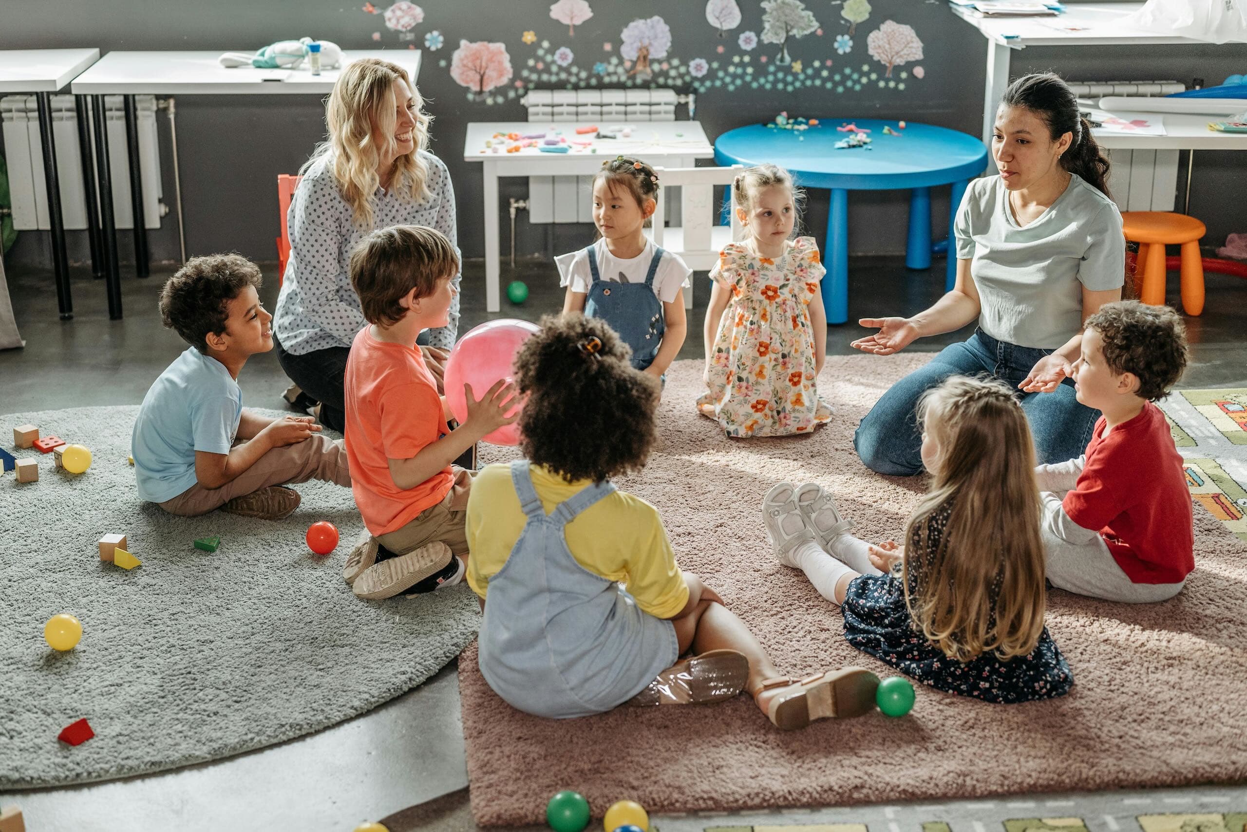 Early childhood educators and children in a classroom